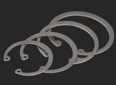Hole with clamp spring retaining ring